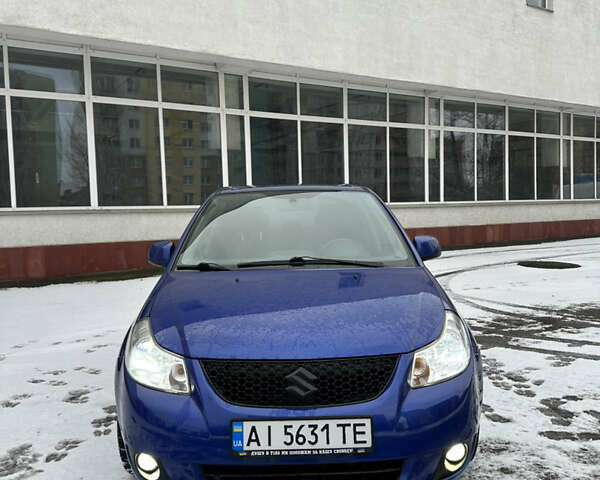 Синий Сузуки СХ4, объемом двигателя 1.6 л и пробегом 315 тыс. км за 4600 $, фото 2 на Automoto.ua