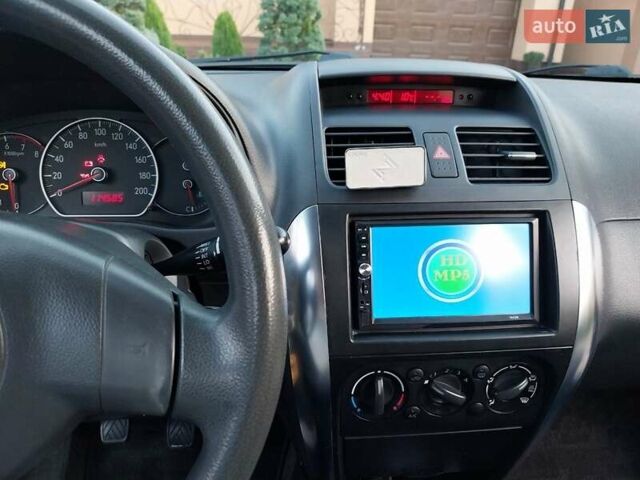 Синий Сузуки СХ4, объемом двигателя 1.59 л и пробегом 114 тыс. км за 4200 $, фото 22 на Automoto.ua