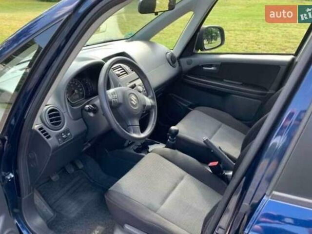 Синий Сузуки СХ4, объемом двигателя 1.6 л и пробегом 215 тыс. км за 7000 $, фото 8 на Automoto.ua