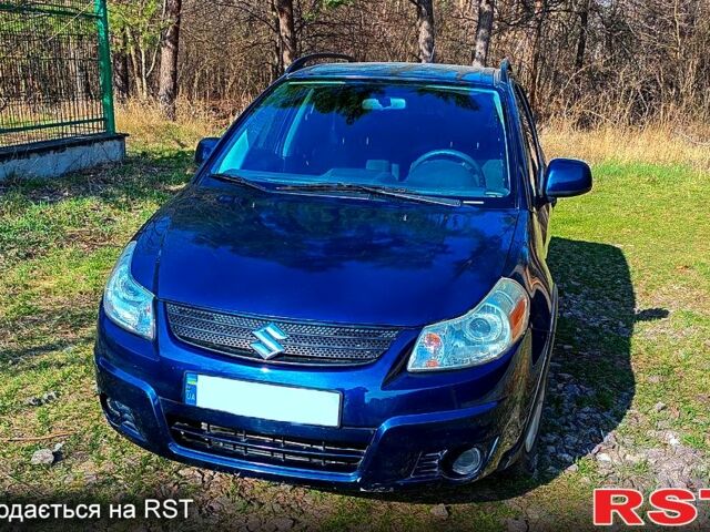 Синий Сузуки СХ4, объемом двигателя 2 л и пробегом 142 тыс. км за 6999 $, фото 1 на Automoto.ua