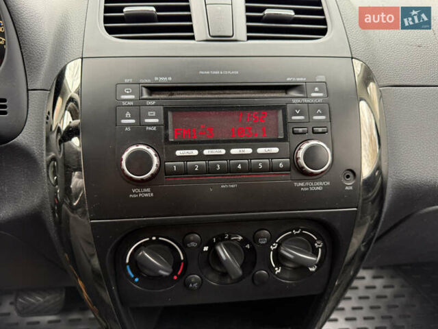 Синий Сузуки СХ4, объемом двигателя 2 л и пробегом 210 тыс. км за 7450 $, фото 14 на Automoto.ua