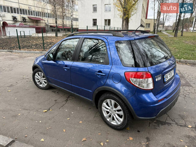 Синий Сузуки СХ4, объемом двигателя 2 л и пробегом 210 тыс. км за 7450 $, фото 2 на Automoto.ua