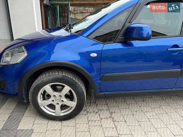 Синий Сузуки СХ4, объемом двигателя 1.59 л и пробегом 145 тыс. км за 8800 $, фото 7 на Automoto.ua