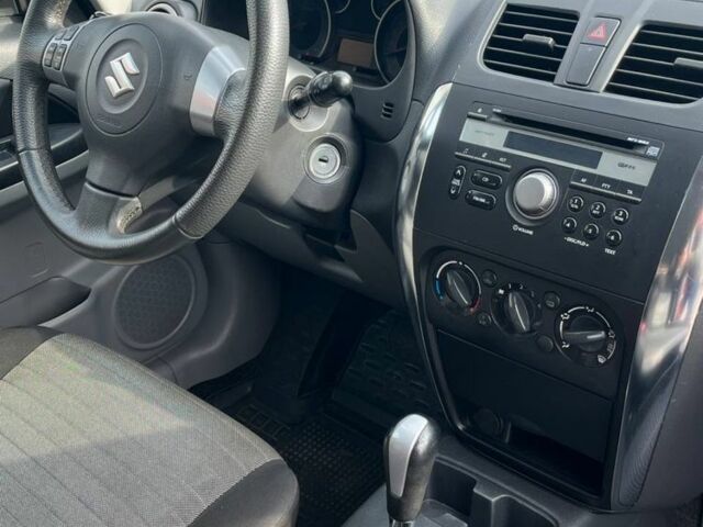 Синий Сузуки СХ4, объемом двигателя 1.6 л и пробегом 138 тыс. км за 9300 $, фото 10 на Automoto.ua