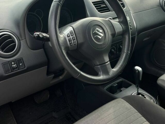 Синий Сузуки СХ4, объемом двигателя 1.6 л и пробегом 138 тыс. км за 9300 $, фото 7 на Automoto.ua