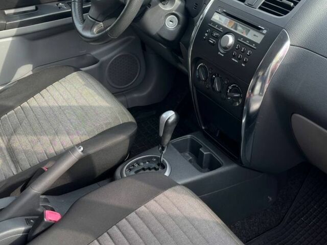 Синий Сузуки СХ4, объемом двигателя 1.6 л и пробегом 138 тыс. км за 9300 $, фото 12 на Automoto.ua