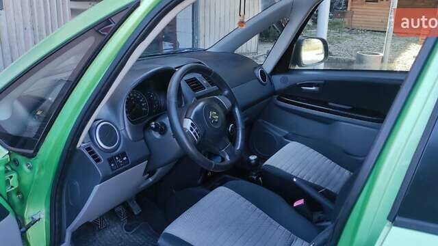 Зеленый Сузуки СХ4, объемом двигателя 1.59 л и пробегом 275 тыс. км за 4800 $, фото 14 на Automoto.ua