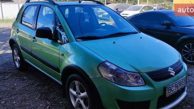 Зеленый Сузуки СХ4, объемом двигателя 1.59 л и пробегом 275 тыс. км за 4800 $, фото 5 на Automoto.ua