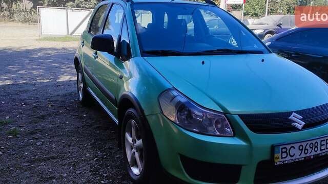 Зеленый Сузуки СХ4, объемом двигателя 1.59 л и пробегом 275 тыс. км за 4800 $, фото 6 на Automoto.ua