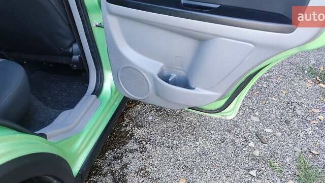 Зеленый Сузуки СХ4, объемом двигателя 1.59 л и пробегом 275 тыс. км за 4800 $, фото 11 на Automoto.ua