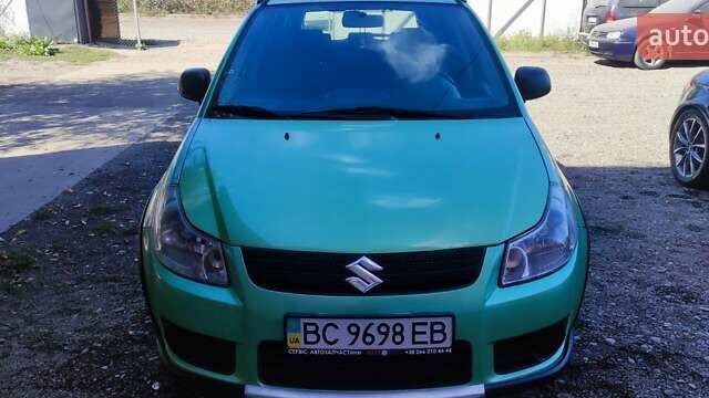 Зеленый Сузуки СХ4, объемом двигателя 1.59 л и пробегом 275 тыс. км за 4800 $, фото 3 на Automoto.ua
