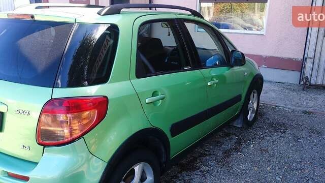 Зеленый Сузуки СХ4, объемом двигателя 1.59 л и пробегом 275 тыс. км за 4800 $, фото 8 на Automoto.ua