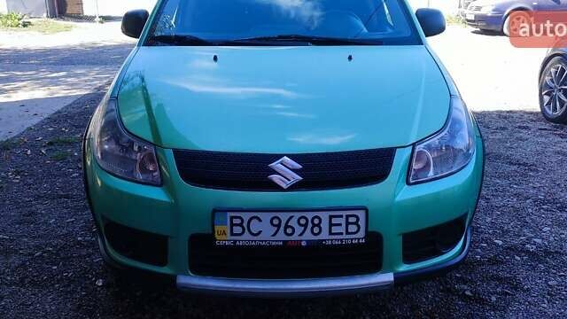 Зеленый Сузуки СХ4, объемом двигателя 1.59 л и пробегом 275 тыс. км за 4800 $, фото 9 на Automoto.ua