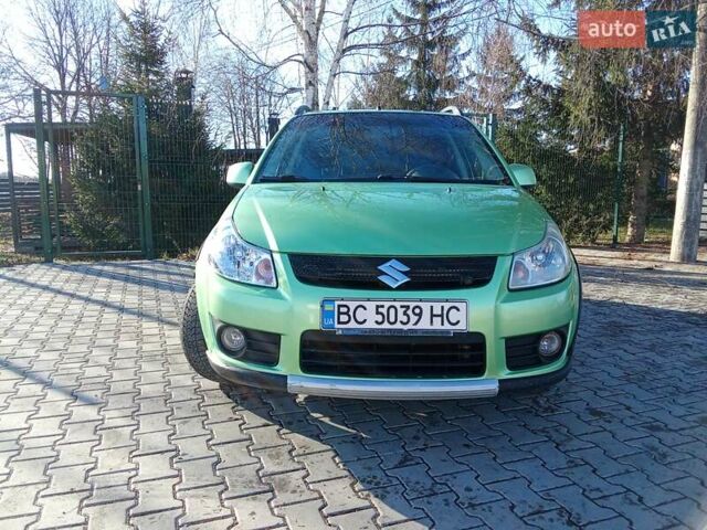 Зеленый Сузуки СХ4, объемом двигателя 1.6 л и пробегом 205 тыс. км за 4900 $, фото 1 на Automoto.ua