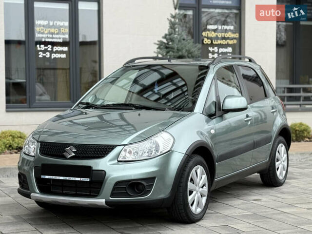 Зеленый Сузуки СХ4, объемом двигателя 1.6 л и пробегом 164 тыс. км за 8950 $, фото 2 на Automoto.ua