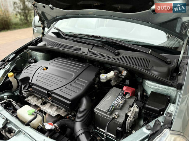 Зеленый Сузуки СХ4, объемом двигателя 1.6 л и пробегом 164 тыс. км за 8950 $, фото 16 на Automoto.ua