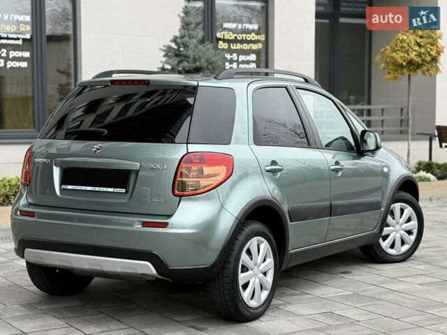 Зеленый Сузуки СХ4, объемом двигателя 1.6 л и пробегом 164 тыс. км за 8950 $, фото 3 на Automoto.ua