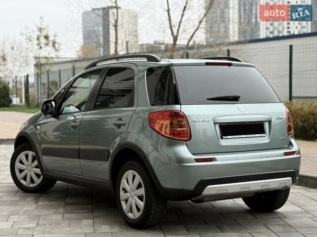 Зеленый Сузуки СХ4, объемом двигателя 1.6 л и пробегом 164 тыс. км за 8950 $, фото 5 на Automoto.ua