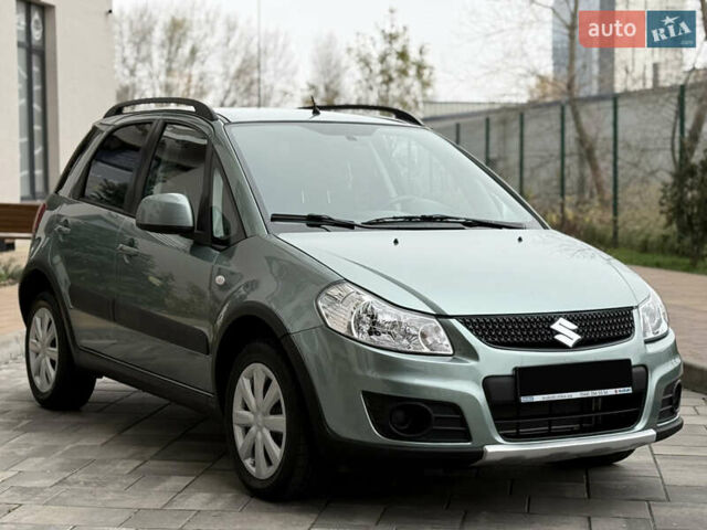 Зеленый Сузуки СХ4, объемом двигателя 1.6 л и пробегом 164 тыс. км за 8950 $, фото 1 на Automoto.ua