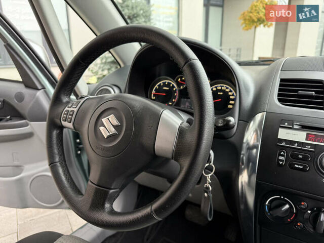 Зеленый Сузуки СХ4, объемом двигателя 1.6 л и пробегом 164 тыс. км за 8950 $, фото 12 на Automoto.ua