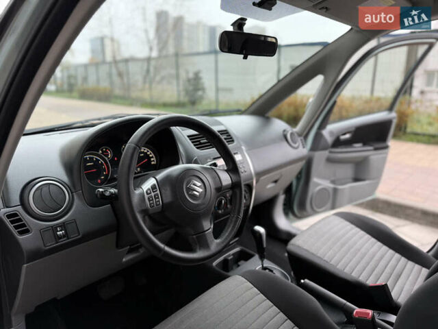 Зеленый Сузуки СХ4, объемом двигателя 1.6 л и пробегом 164 тыс. км за 8950 $, фото 9 на Automoto.ua