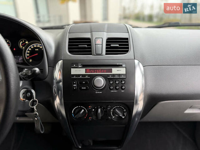 Зеленый Сузуки СХ4, объемом двигателя 1.6 л и пробегом 164 тыс. км за 8950 $, фото 13 на Automoto.ua