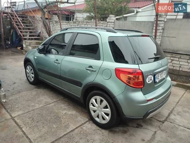 Зеленый Сузуки СХ4, объемом двигателя 1.59 л и пробегом 173 тыс. км за 7500 $, фото 3 на Automoto.ua