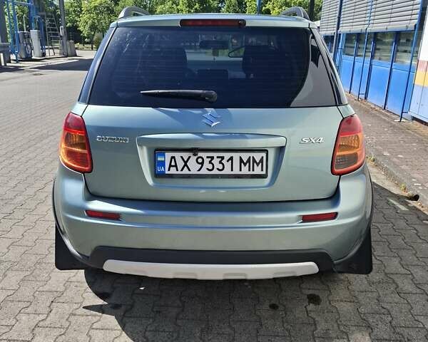 Зеленый Сузуки СХ4, объемом двигателя 1.59 л и пробегом 147 тыс. км за 10500 $, фото 2 на Automoto.ua