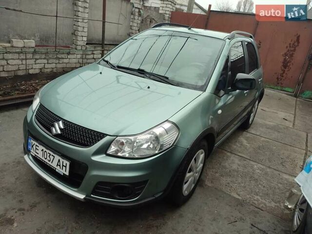 Зеленый Сузуки СХ4, объемом двигателя 1.59 л и пробегом 173 тыс. км за 7500 $, фото 2 на Automoto.ua
