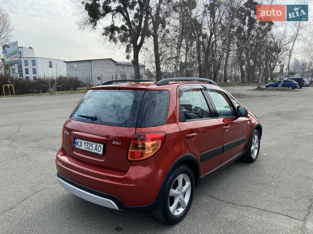 Оранжевый Сузуки СХ4, объемом двигателя 1.6 л и пробегом 215 тыс. км за 7300 $, фото 5 на Automoto.ua