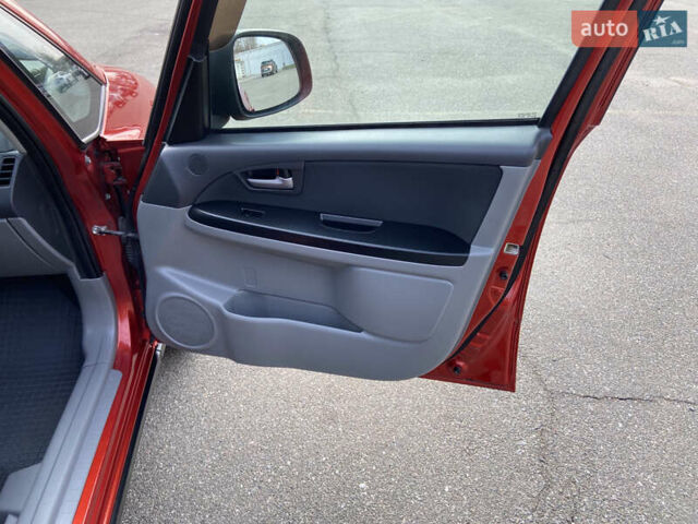 Оранжевый Сузуки СХ4, объемом двигателя 1.6 л и пробегом 215 тыс. км за 7300 $, фото 25 на Automoto.ua