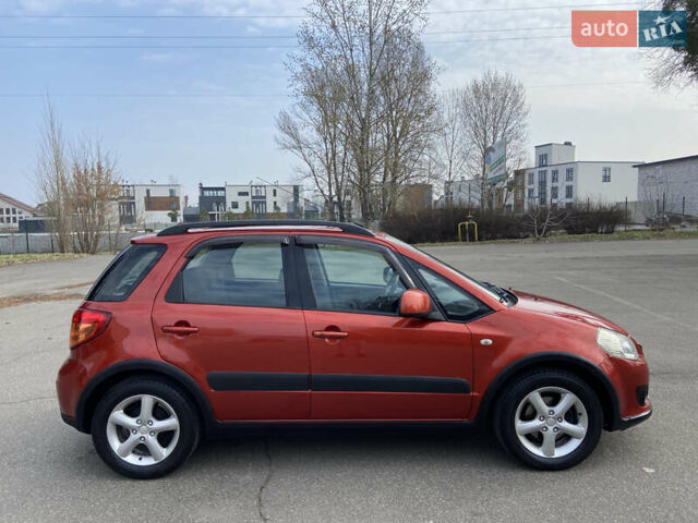 Оранжевый Сузуки СХ4, объемом двигателя 1.6 л и пробегом 215 тыс. км за 7300 $, фото 4 на Automoto.ua