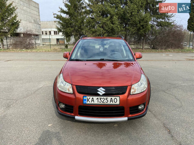 Оранжевый Сузуки СХ4, объемом двигателя 1.6 л и пробегом 215 тыс. км за 7300 $, фото 2 на Automoto.ua