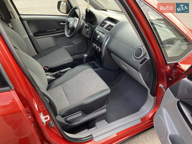 Оранжевый Сузуки СХ4, объемом двигателя 1.6 л и пробегом 215 тыс. км за 7300 $, фото 26 на Automoto.ua