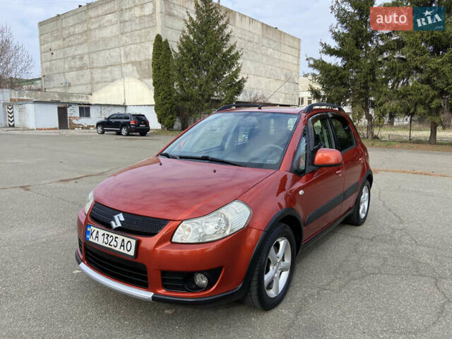 Оранжевый Сузуки СХ4, объемом двигателя 1.6 л и пробегом 215 тыс. км за 7300 $, фото 1 на Automoto.ua