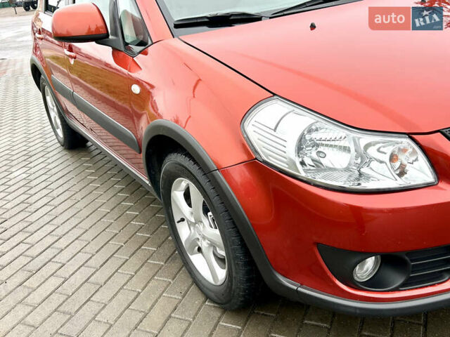 Помаранчевий Сузукі СХ4, об'ємом двигуна 1.6 л та пробігом 240 тис. км за 7500 $, фото 11 на Automoto.ua