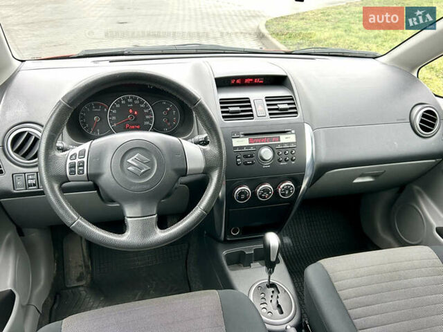 Помаранчевий Сузукі СХ4, об'ємом двигуна 1.6 л та пробігом 240 тис. км за 7500 $, фото 28 на Automoto.ua
