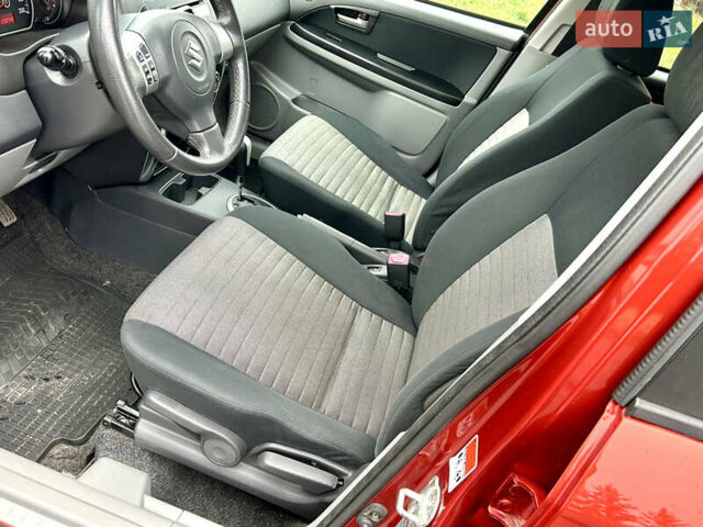 Помаранчевий Сузукі СХ4, об'ємом двигуна 1.6 л та пробігом 240 тис. км за 7500 $, фото 23 на Automoto.ua