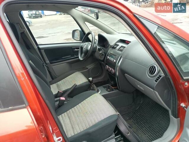 Оранжевый Сузуки СХ4, объемом двигателя 1.6 л и пробегом 181 тыс. км за 7500 $, фото 6 на Automoto.ua