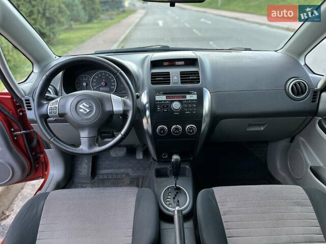 Помаранчевий Сузукі СХ4, об'ємом двигуна 1.6 л та пробігом 202 тис. км за 7200 $, фото 25 на Automoto.ua