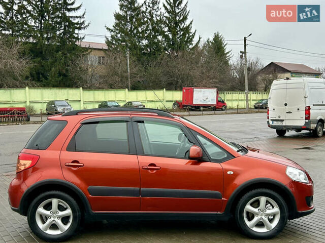 Помаранчевий Сузукі СХ4, об'ємом двигуна 1.6 л та пробігом 240 тис. км за 7500 $, фото 3 на Automoto.ua