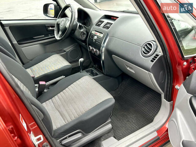 Помаранчевий Сузукі СХ4, об'ємом двигуна 1.6 л та пробігом 240 тис. км за 7500 $, фото 33 на Automoto.ua