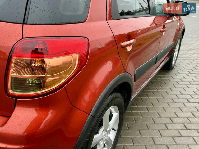 Помаранчевий Сузукі СХ4, об'ємом двигуна 1.6 л та пробігом 240 тис. км за 7500 $, фото 16 на Automoto.ua