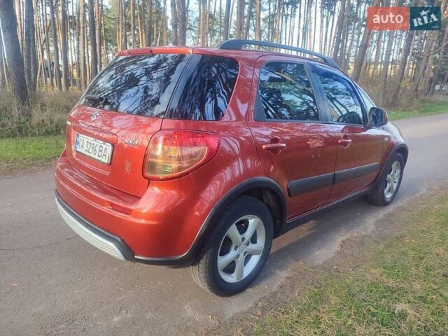 Оранжевый Сузуки СХ4, объемом двигателя 1.6 л и пробегом 202 тыс. км за 6100 $, фото 2 на Automoto.ua