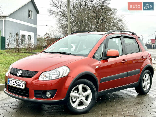 Помаранчевий Сузукі СХ4, об'ємом двигуна 1.6 л та пробігом 240 тис. км за 7500 $, фото 17 на Automoto.ua