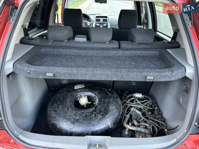 Помаранчевий Сузукі СХ4, об'ємом двигуна 1.6 л та пробігом 202 тис. км за 7200 $, фото 33 на Automoto.ua