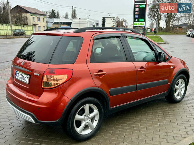 Помаранчевий Сузукі СХ4, об'ємом двигуна 1.6 л та пробігом 240 тис. км за 7500 $, фото 4 на Automoto.ua
