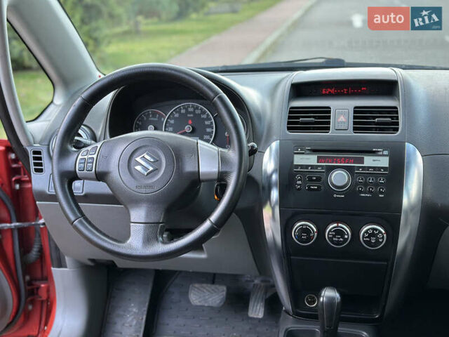 Помаранчевий Сузукі СХ4, об'ємом двигуна 1.6 л та пробігом 202 тис. км за 7200 $, фото 26 на Automoto.ua