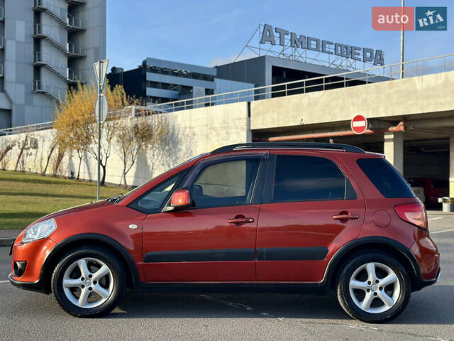 Помаранчевий Сузукі СХ4, об'ємом двигуна 1.6 л та пробігом 202 тис. км за 7200 $, фото 17 на Automoto.ua