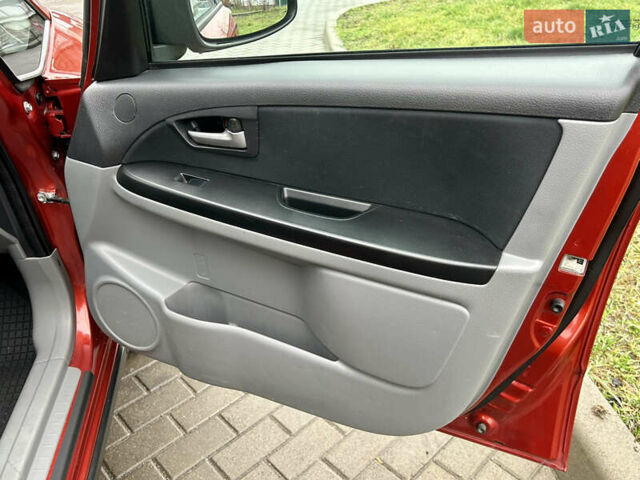 Помаранчевий Сузукі СХ4, об'ємом двигуна 1.6 л та пробігом 240 тис. км за 7500 $, фото 34 на Automoto.ua